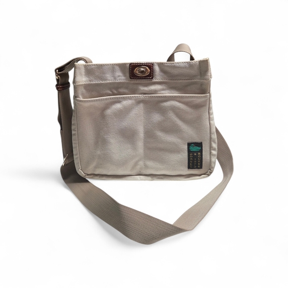 Dooney & Bourke Handbags - Dooney & Bourke Canvas 28 Cream Crossbody Bag